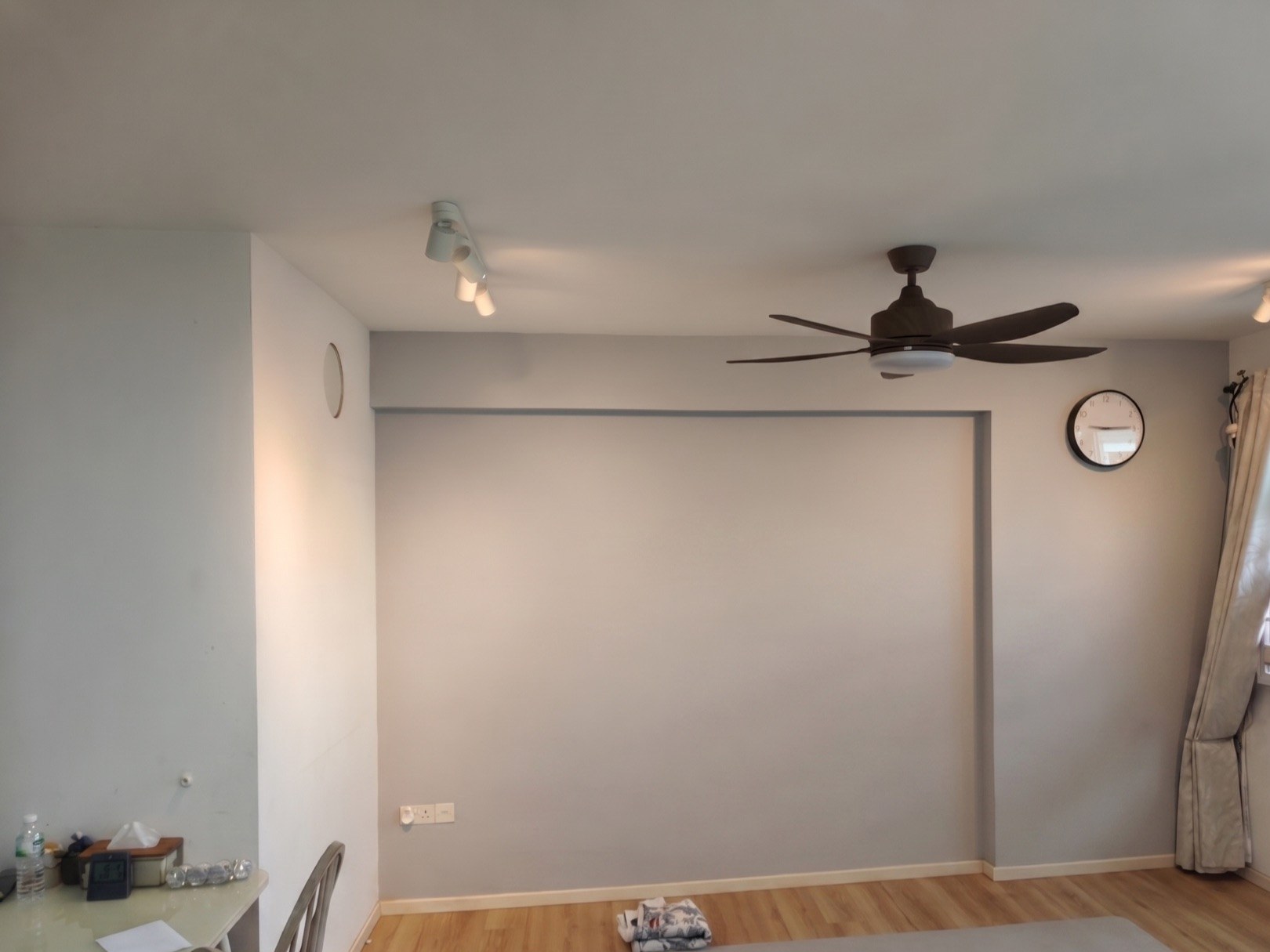 Bare living-room wall in a Tampines HDB flat before renovation